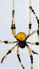 Yellow and black beaded spider